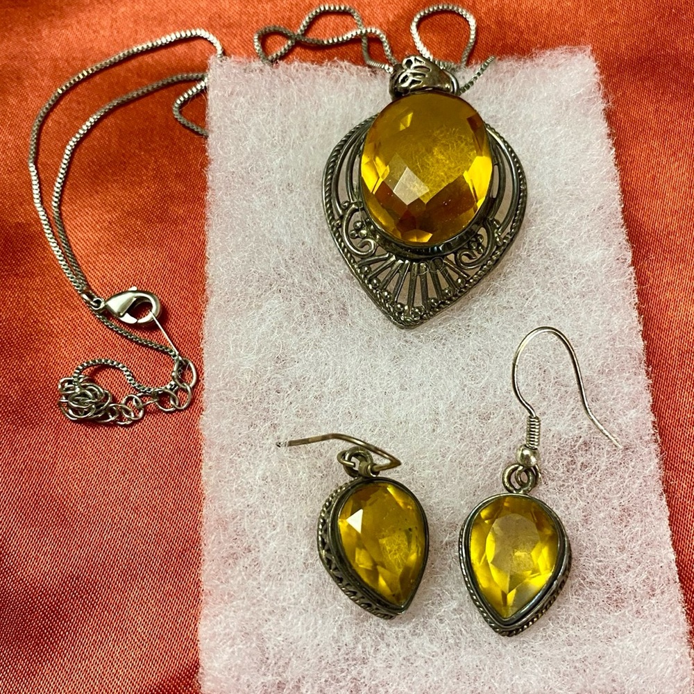 Gold Necklace with Ornate Pendant and Filigree Details